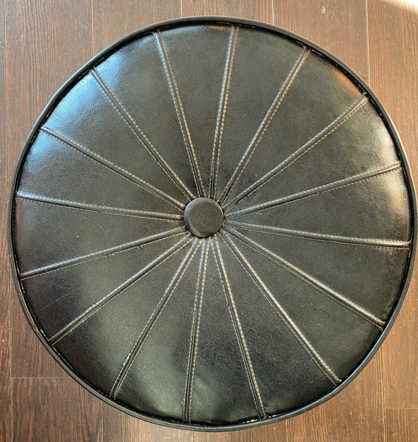 Sunburst pattern on top of Vintage Black Leather Hassock with Hollywood Legs- Cook Street Vintage