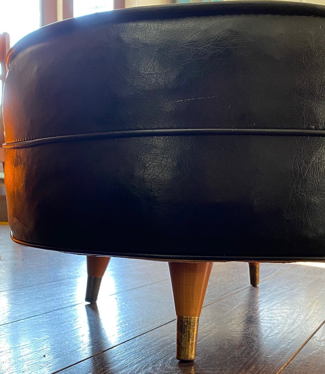 Vintage Black Leather Hassock with Hollywood Legs- Cook Street Vintage